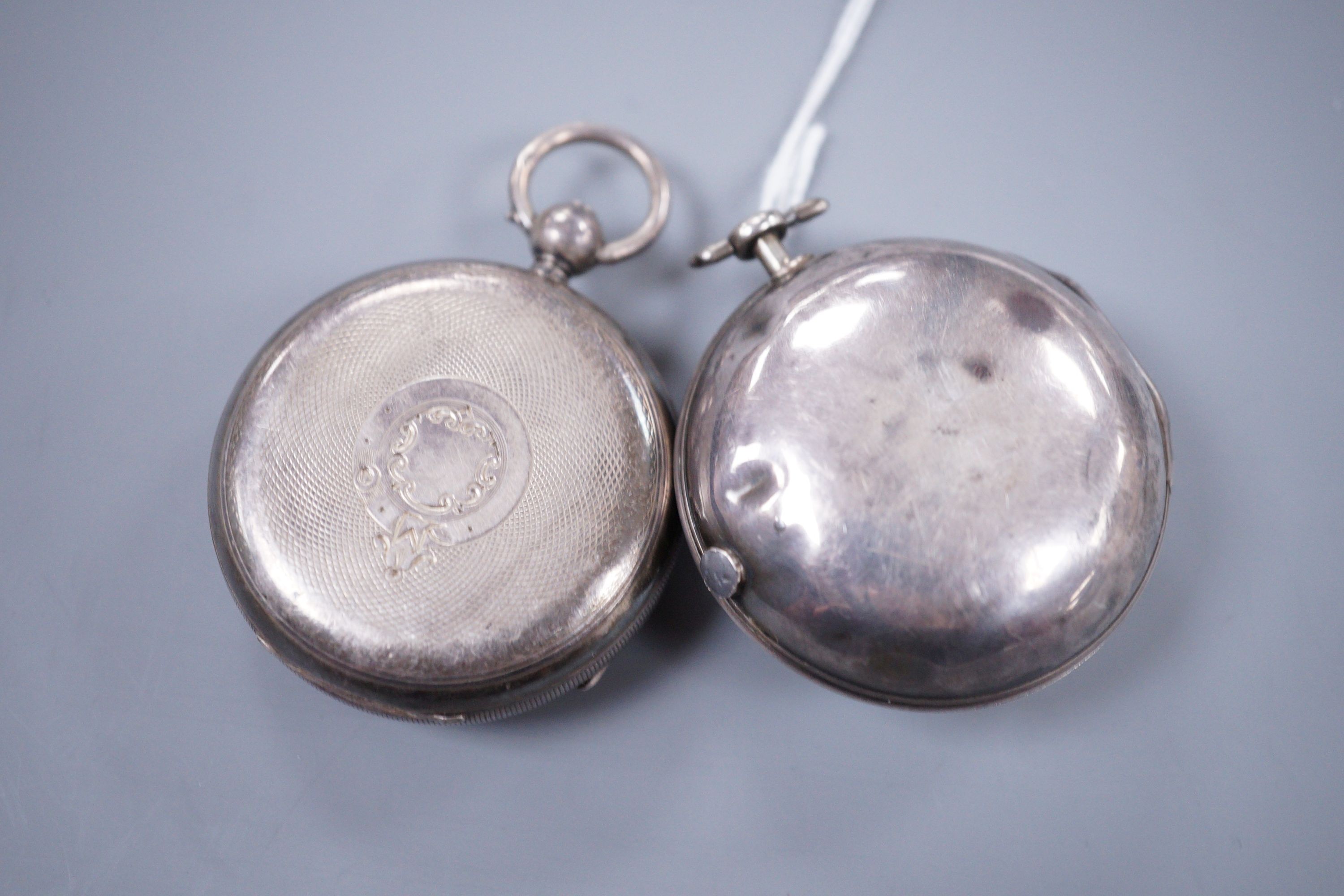 A George III pair cased pocket watch by J. Thims of London no.438 with verge movement and squared baluster pillars and a later silver pocket watch